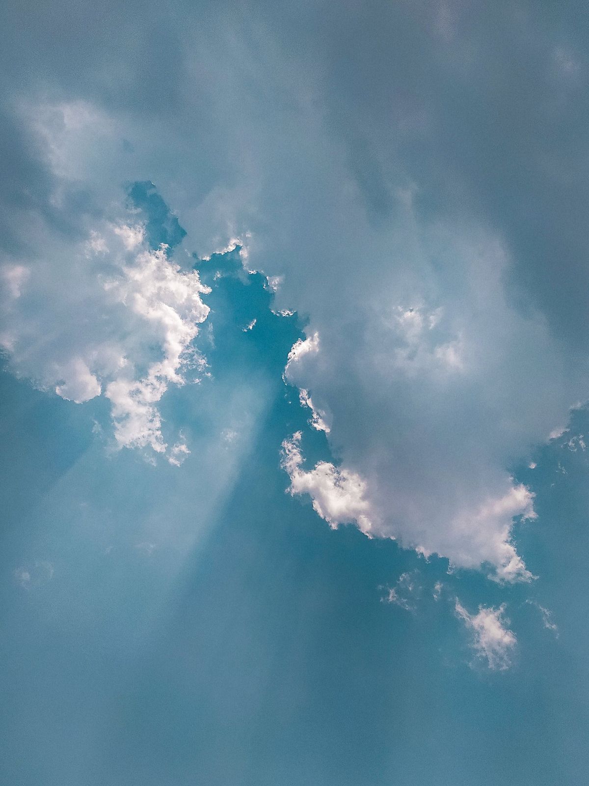 Sunrays passing through clouds symbolizing Arteco Consulting's Integration and Automation service