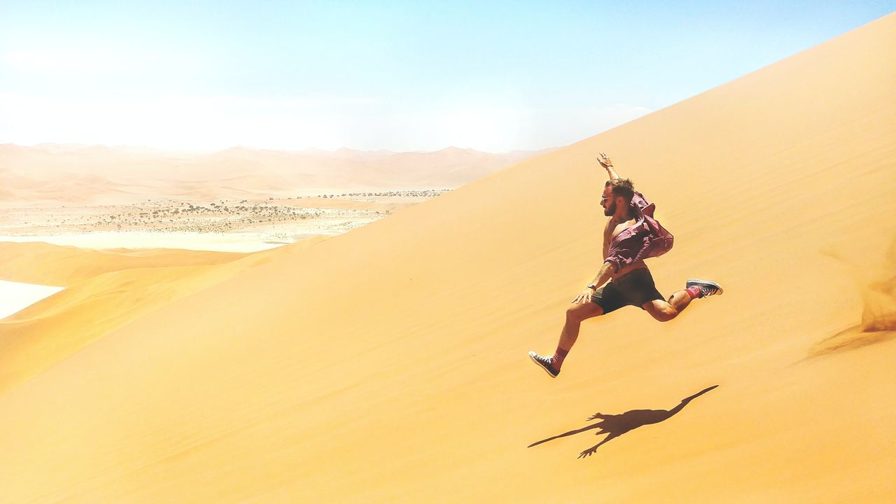 Person running through the desert